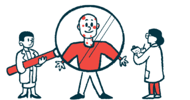 A man with spots on his face stands behind a giant magnifying glass held by two people in white coats.