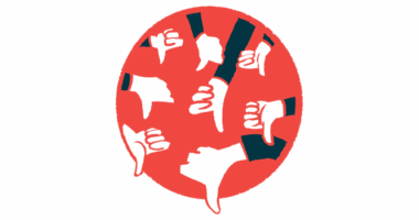 An illustration of many hands giving a thumbs down gesture.