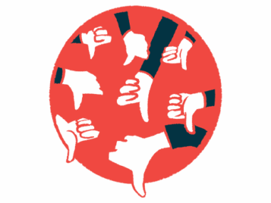 An illustration of many hands giving a thumbs down gesture.