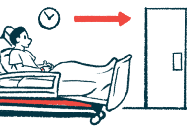 A patient sits in a hospital bed in a hallway near a set of closed double doors.